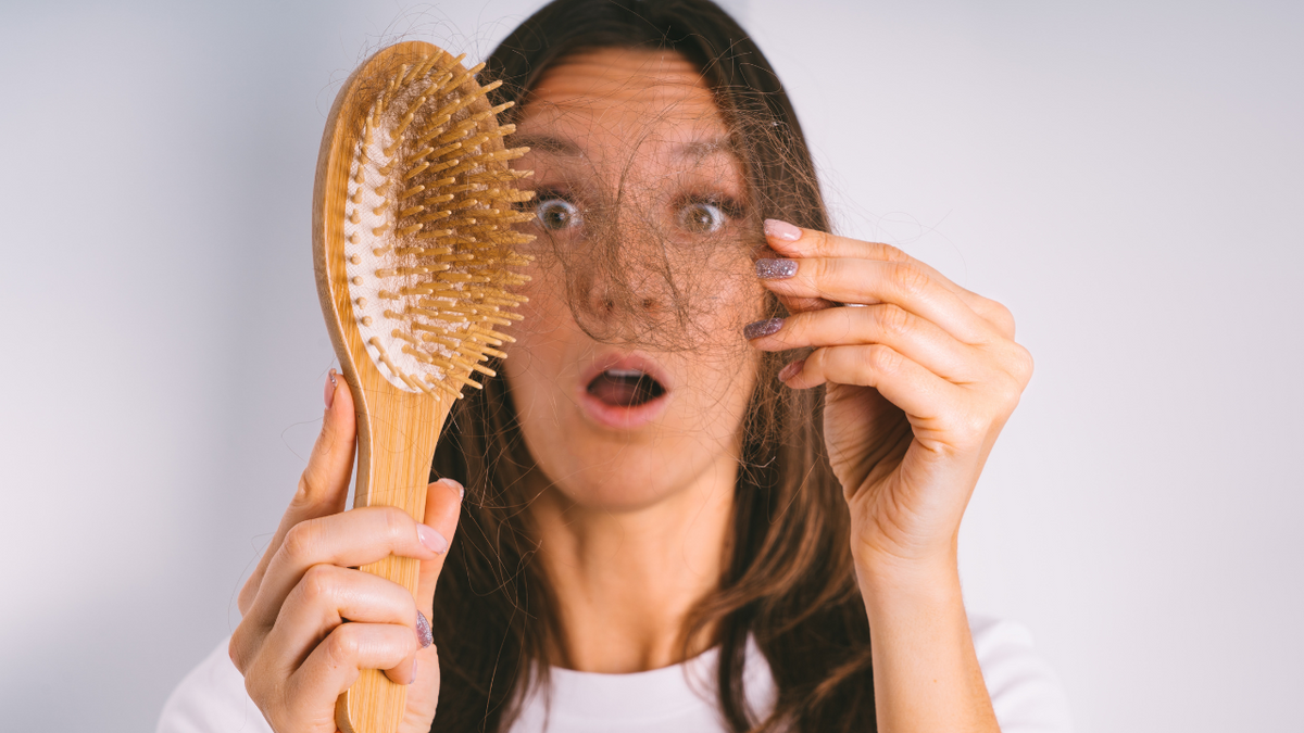hair tangled in hair brush due to shedding